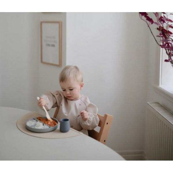 RAINBOW śliniak z długim rękawem i kieszonką Mushie 6m+