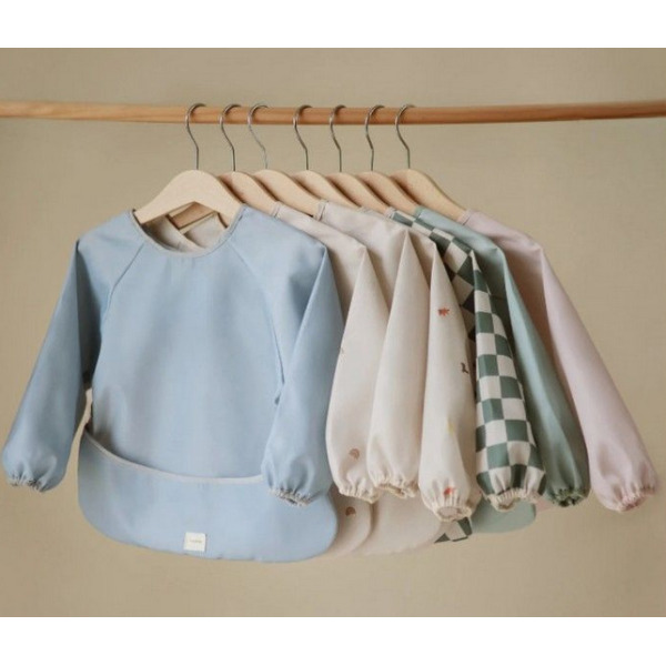 RAINBOW śliniak z długim rękawem i kieszonką Mushie 6m+