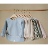 DINOZAURY śliniak z długim rękawem i kieszonką Mushie 6m+