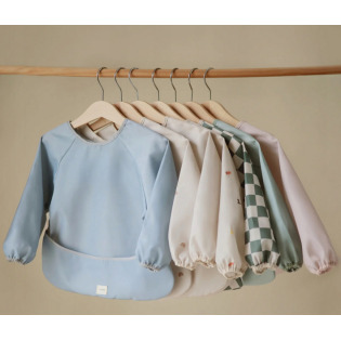 DINOZAURY śliniak z długim rękawem i kieszonką Mushie 6m+