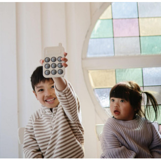 TELEFON zabawka sensoryczna Press Toy Tradewinds Mushie 10m+