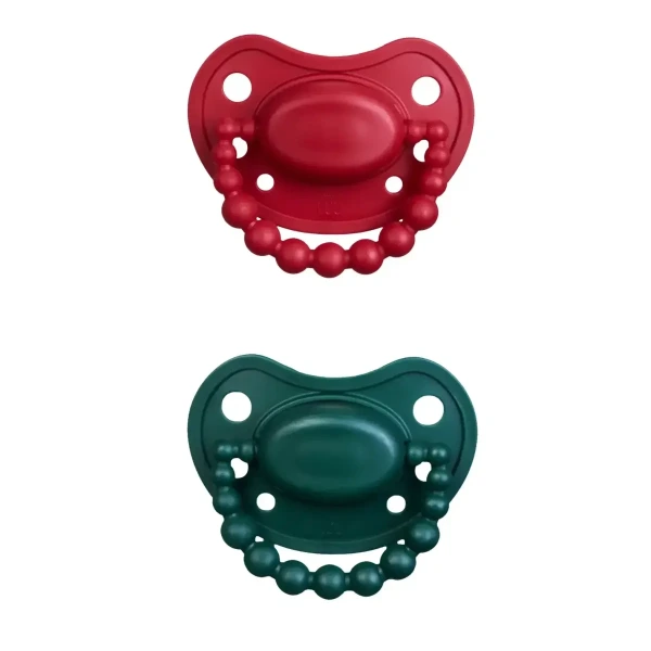 Smoczek pozycjonujący zestaw świąteczny 2 smoczków HOLY GREEN i SANTA RED 3-6M LUU Kids